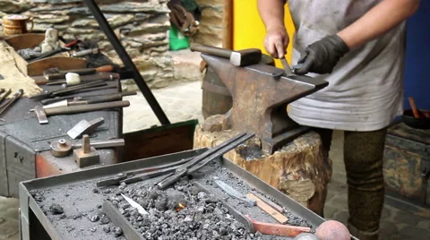 Blacksmith. Medieval tradition of making armor and swords at the forge. Stock Footage 40621887