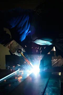 Blacksmith melting iron Stock Photos