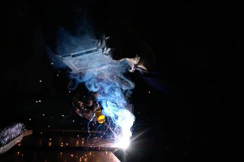 Blacksmith melting iron Foto stock