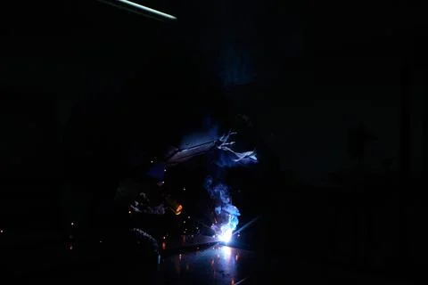 Blacksmith melting iron Stock Photos