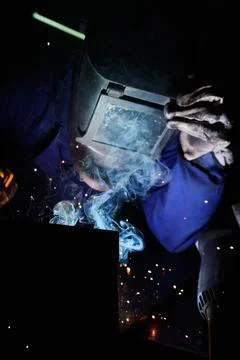 Blacksmith melting iron Stock Photos