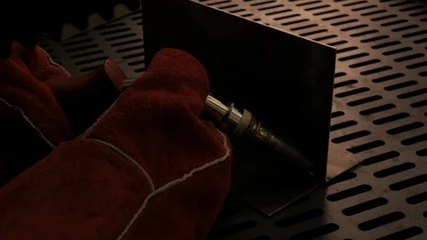 A blacksmith or welde Stock Footage 106948254