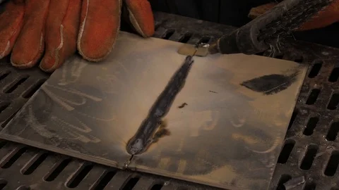 A blacksmith or welde Stock Footage 106949331