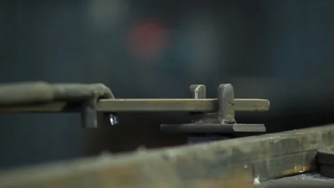 Blacksmith shapes the metal, close up Stock Footage 72070372