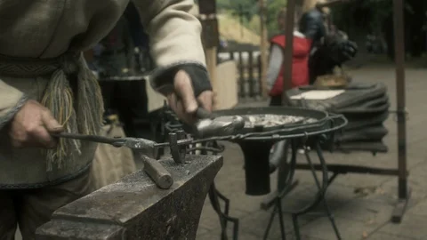 Blacksmith Shaping a Horseshoe Stock Footage 94254129