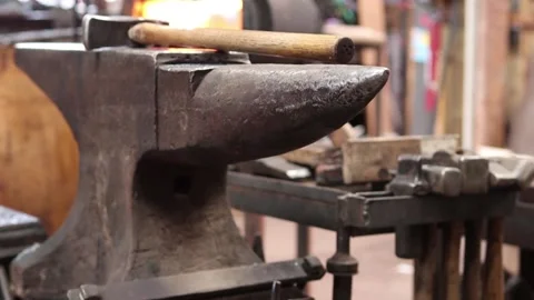 Blacksmith shop dolly from anvil to forge with audio Stock Footage 134222503