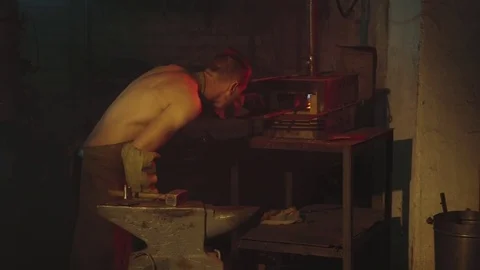 Blacksmith in smithy Stock Footage 78222615