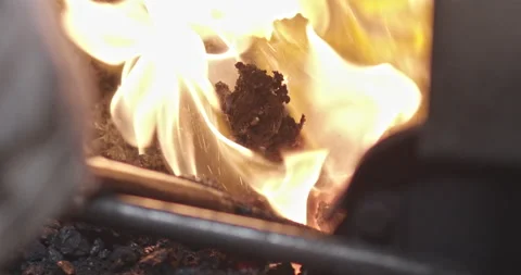 Blacksmith Stokes Forge Fire-Moving Coals 스톡 동영상 152253131