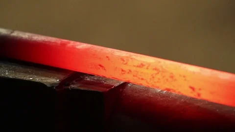 Blacksmith strikes red hot iron, closeup Stock Footage 72219018