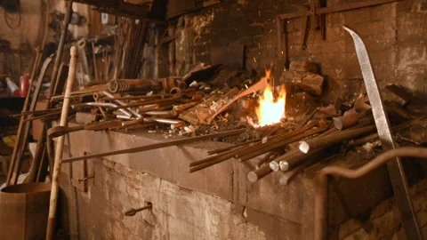 Blacksmith tools in a hot oven Stock Footage 103748545