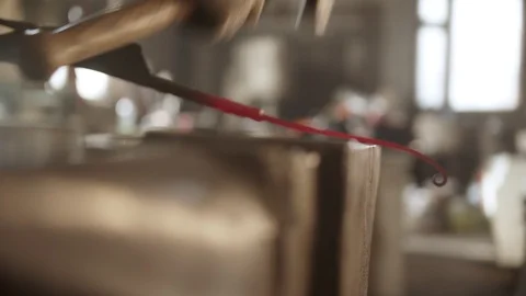 Blacksmith torque the longer piece of metal - making a handle Stock Footage 125353623