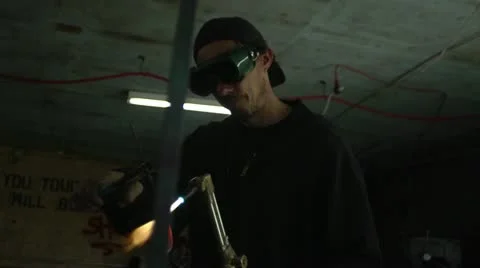 Blacksmith using blowtorch Stock Footage 12660198