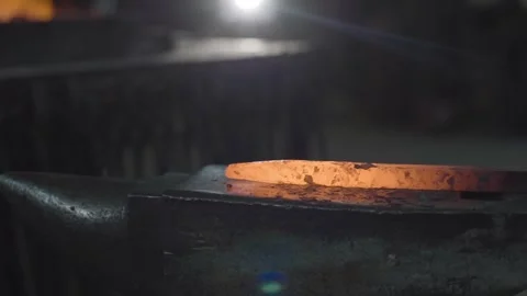 Blacksmith is using hammer to forge metal Stock Footage 298871029