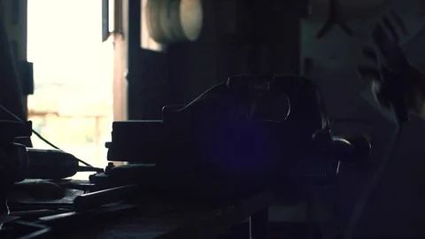 Blacksmith welding metal in the workshop Stock Footage 128597757