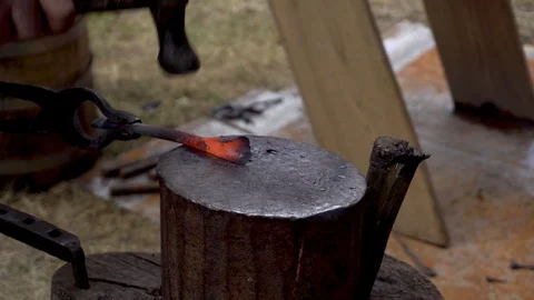 Blacksmith work. The blacksmith does arrow from metal. Stock Footage 130117667