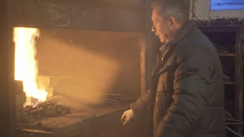 Blacksmith at work Stock Footage 73352179