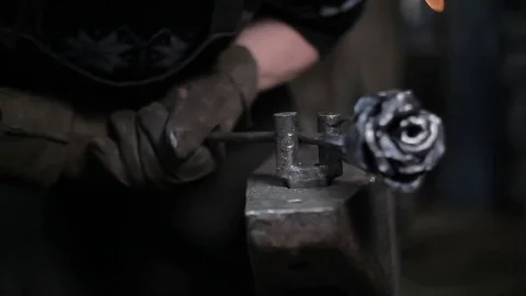 Blacksmith at work in his workshop Видео 80549663