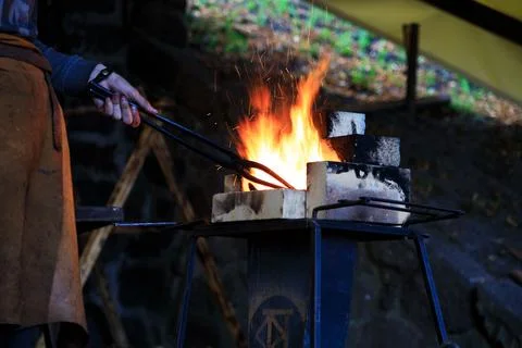 Blacksmith at work. Process of manufacture. Smithcraft. Stock Photos
