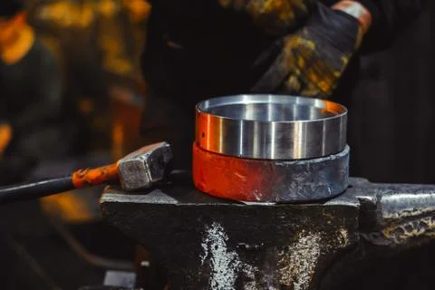 Blacksmith working on an anvil Stock Photos