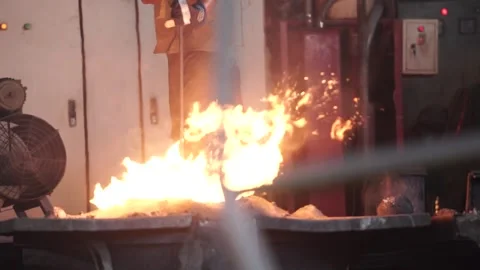 Blacksmith working in the fireplace Stock Footage 259863008