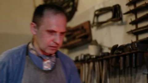 Blacksmith working at the furnace Stock Footage 67734283