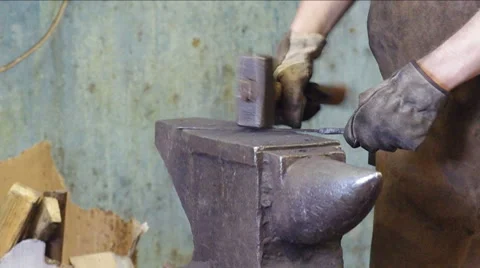 Blacksmith working on metal. Stock Footage 64368789