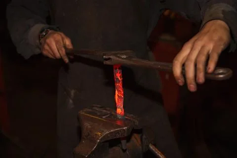 Blacksmith working with vise Stock Photos