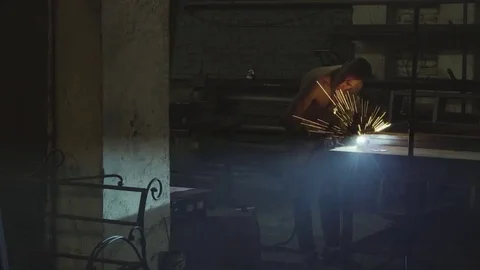 Blacksmith works in smithy Stock Footage 78222893