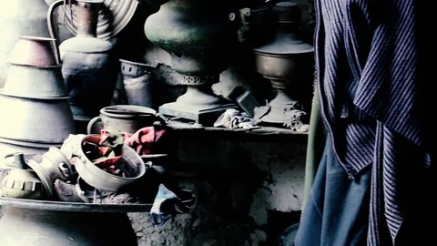 Blacksmith workshop and many hand made copper dishes, Lahich, Azerbaijan Stock Footage 81473865
