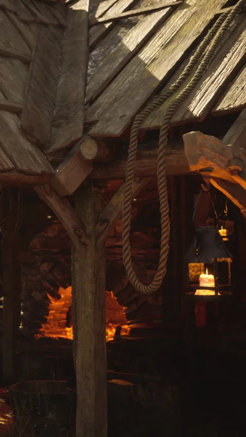 Blacksmith workshop shows tools and heat from furnace at dusk Stock Footage 339042250