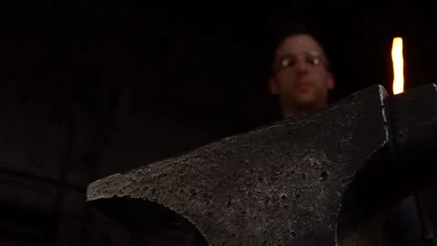 Blacksmithing Hot Metal with Slow Motion Sparks in Forge Stock Footage 255408841
