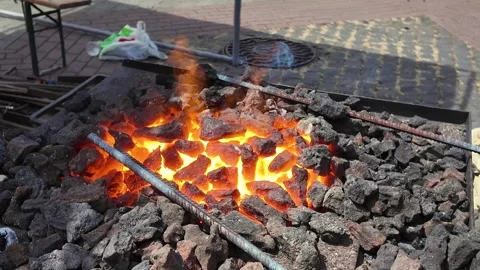 Blacksmithing, master class.  Heating steel reinforcement Stock Footage 335272051