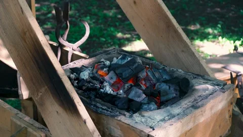 Blacksmith's bellows for heating a metal workpiece Stock Footage 342617935