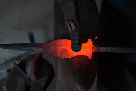 Blacksmiths coals burning for iron work Stock Photos