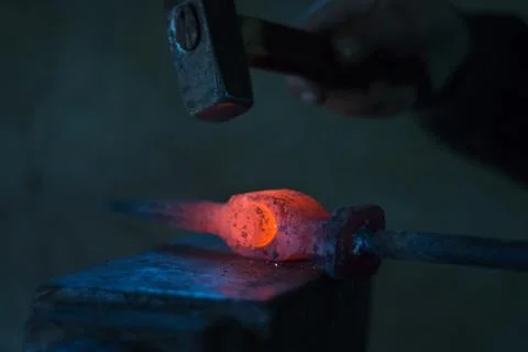 Blacksmiths coals burning for iron work Stock Photos