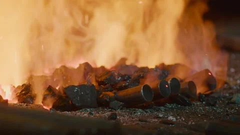 A blacksmith's forge is burning in the forge Stock Footage 153349113