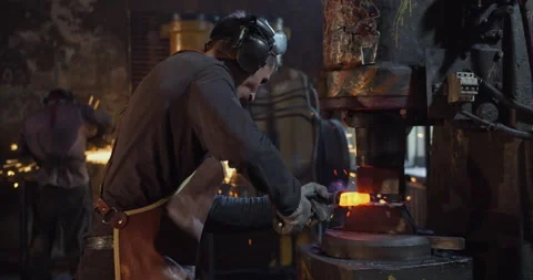 Blacksmiths in the process of creating a product Stock Footage 144517058