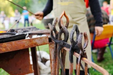 Blacksmith's tools against the backdrop of fire Stock Photos