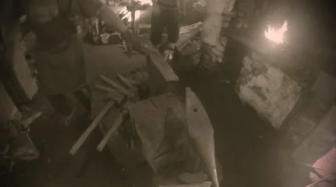 Blacksmiths work in unique water forge, retro vintage, black and white Stock Footage 46419014
