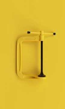 Black&Yellow clamp on yellow background. 3d render Stock Illustration
