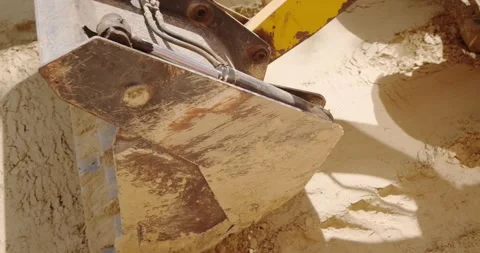 The blade of a bulldozer digging the ground Stock Footage 140233940