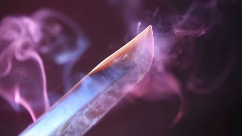 Blade of a knife close-up on a red background. Steel arms, Dagger. Blade clos Stockbeeldmateriaal 93045886