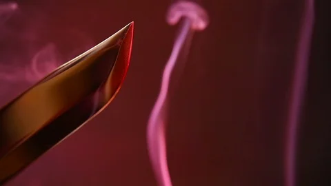 Blade of a knife close-up on a red background. Steel arms, Dagger. Blade clos Stock Footage 93046046