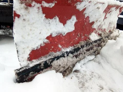 A blade pushes the snow Photos