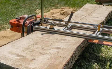 Blade sawing using a mobile chainsaw mill Stock Photos