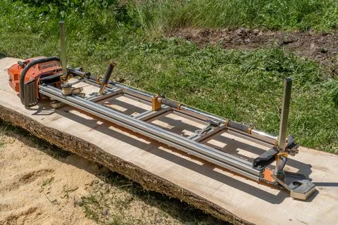 Blade sawing using a mobile chainsaw mill Stock Photos