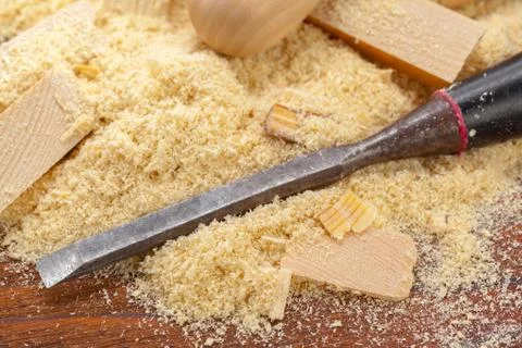 Blade of sharp chisels with sawdust Stock Photos