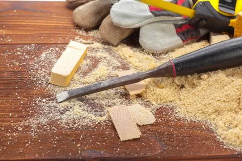 Blade of sharp chisels with sawdust Stock Photos
