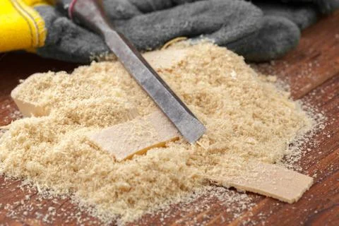 Blade of sharp chisels with sawdust Stock Photos
