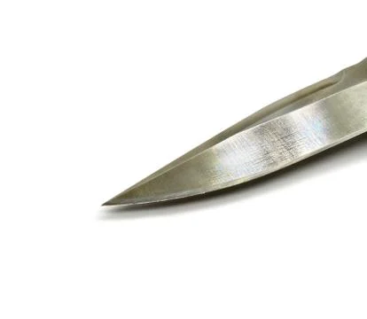 Blade sharp knife silver color with texture isolated on white background. Stock Photos